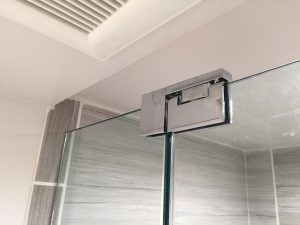 Small bathroom shower door installation